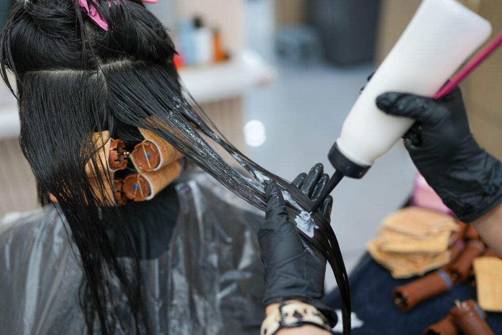 Applying digital perm ingredients at PERFECT X HAIR